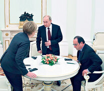 Merkel, Putin y Hollande siguen con preocupación los eventos en Ucrania.  (Fuente: EFE) (Fuente: EFE) (Fuente: EFE)