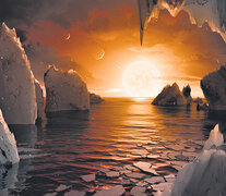 Uno de los planetas, el Trappist-1f, tal como lo imagina la NASA, con océanos y zonas tal vez habitables. (Fuente: EFE) (Fuente: EFE) (Fuente: EFE)
