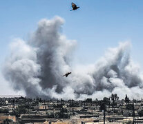 En Raqqa se intesificaron los bombardeos sobre la ciudad. (Fuente: AFP) (Fuente: AFP) (Fuente: AFP)