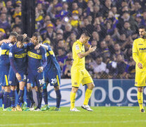 Los jugadores de Boca festejan el triunfo ante el Villarreal español, el miércoles por la noche. (Fuente: EFE) (Fuente: EFE) (Fuente: EFE)