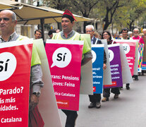 La Asamblea Nacional Catalana celebró un acto en el que algunos de sus miembros se disfrazaron de anuncio a favor del SI a la autodeterminación. (Fuente: EFE) (Fuente: EFE) (Fuente: EFE)