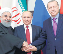 De izq. a der.: los presidentes Hassan Rohani (Irán), Vladimir Putin (Rusia) y Recep Tayyip Erdogan (Turquía). (Fuente: AFP) (Fuente: AFP) (Fuente: AFP)