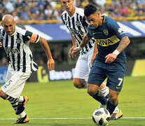 Guiñazú y Pavón disputan la pelota. Fueron las figuras del partido más atractivo de la fecha. (Fuente: Julio Martín Mancini) (Fuente: Julio Martín Mancini) (Fuente: Julio Martín Mancini)