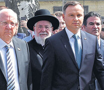 El presidente Livkin, primero desde la izquierda, junto a su par polaco Duda. (Fuente: AFP) (Fuente: AFP) (Fuente: AFP)