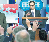 El asesor de seguridad nacional, John Bolton, y el secretario del Tesoro de EE.UU., Steven Mnuchin. (Fuente: AFP) (Fuente: AFP) (Fuente: AFP)