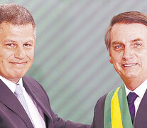 Gustavo Bebbiano, junto al presidente Bolsonaro, al asumir como secretario general de la Presidencia de Brasil. (Fuente: AFP) (Fuente: AFP) (Fuente: AFP)