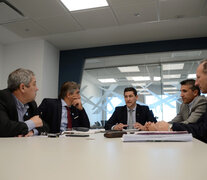 Neri, presidente de la EPE, con directores.