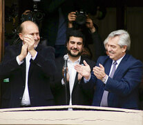 Perotti, Cleri y Fernández en el acto en ATE.