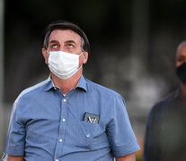 Bolsonaro sigue de gira pero el viernes no se sacó el barbijo. (Fuente: AFP) (Fuente: AFP) (Fuente: AFP)