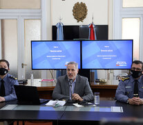 Sain junto a Muñoz (jefa policial de la UN I),  y  Zancocchia, subjefe  provincial.