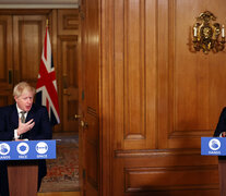 Conferencia virtual de Johnson y su ministro de Hacienda Rishi Sunak para hablar del coronavirus. (Fuente: AFP) (Fuente: AFP) (Fuente: AFP)