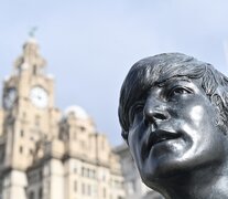 Estatua de Lennon (y los otros Beatles) en Liverpool. (Fuente: AFP) (Fuente: AFP) (Fuente: AFP)