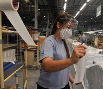 La industria manufacturera, una de las áreas que el informe rescata por su ritmo de repunte. (Fuente: EFE) (Fuente: EFE) (Fuente: EFE)