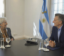 La ex la titular del FMI, Christine Lagarde, junto al ex Presidente, Mauricio Macri.  (Fuente: AFP) (Fuente: AFP) (Fuente: AFP)