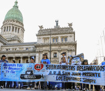 Macri está acusado de ordenar que la AFI vigilara a los parientes  de los submarinistas para que le anticipara cuáles serían sus movimientos y reclamos. (Fuente: NA) (Fuente: NA) (Fuente: NA)