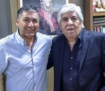 Juan Chulich y Hugo Moyano.