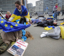 Una manifestación en Bruselas pidiendo el bloqueo de las importaciones de energía rusa. (Fuente: AFP) (Fuente: AFP) (Fuente: AFP)