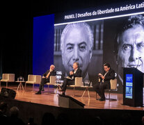 Ante una platea de empresarios y bolsonaristas, Mauricio Macri se mostró junto a Michel Temer.