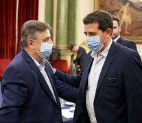 El ministro Wado De Pedro junto al radical Mario Negri.