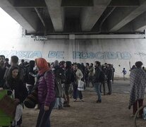 La asamblea de cierre de la doble jornada se mudó abajo del puente por la lluvia. (Fuente: Sebastián Vargas) (Fuente: Sebastián Vargas) (Fuente: Sebastián Vargas)