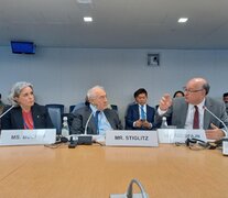 Stiglitz junto a Goldfajn en el encuentro anual del FMI.