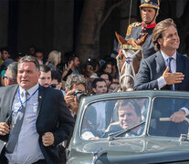 Astesiano, a la izquierda, junto al presidente Lacalle Pou.  (Fuente: AFP) (Fuente: AFP) (Fuente: AFP)