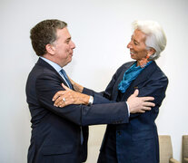 Nicolás Dujovne y Christine Lagarde, mentores de un acuerdo siniestro. (Fuente: AFP) (Fuente: AFP) (Fuente: AFP)