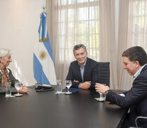 Christine Lagarde, Mauricio Macri y Nicolás Dujovne, los autores de la bomba financiera. (Fuente: Télam) (Fuente: Télam) (Fuente: Télam)