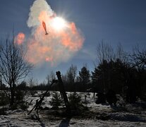 La guerra contra el adversario y contra la nieve. (Fuente: AFP) (Fuente: AFP) (Fuente: AFP)