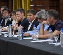 Axel Kicillof junto a Agusto Costa y Walter Correa. 