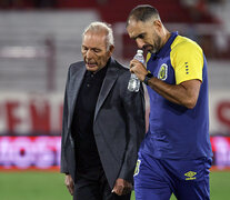 Russo junto al preparador físico.