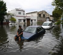 Algunas calles del conurbano se inundaron por completo.  (Fuente: AFP) (Fuente: AFP) (Fuente: AFP)