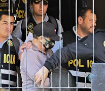 Nicanor Boluarte (centro), detenido en su domicilio. (Fuente: AFP) (Fuente: AFP) (Fuente: AFP)