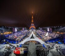 La gran fiesta de la inaguración bajo la lluvia parisina. (Fuente: AFP) (Fuente: AFP) (Fuente: AFP)