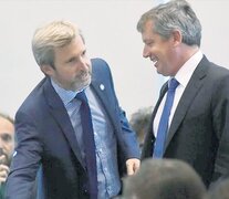 El ministro del Interior, Rogelio Frigerio, y el presidente de la Cámara de Diputados, Emilio Monzó.