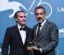 Joaquin Phoenix y Todd Phillips, de festejo. (Fuente: AFP) (Fuente: AFP) (Fuente: AFP)