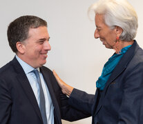 Nicolás Dujovne y Christine Lagarde, dos de los responsables del estallido económico del gobierno de Macri. (Fuente: AFP) (Fuente: AFP) (Fuente: AFP)