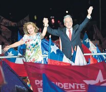 Piñera y Morel, durante la victoria del candidato de derecha. (Fuente: AFP) (Fuente: AFP) (Fuente: AFP)