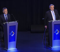 Mauricio Macri y Alberto Fernández durante el debate presidencial en la UBA. (Fuente: NA) (Fuente: NA) (Fuente: NA)