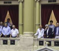 Héctor Daer y Hugo Moyano ayer en los palcos del Congreso. (Fuente: NA) (Fuente: NA) (Fuente: NA)