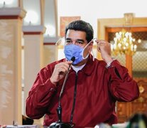Maduro en tiempos de coronavirus, en el palacio de Miraflores. EE.UU. lo acusa de narcoterrorista. (Fuente: AFP) (Fuente: AFP) (Fuente: AFP)