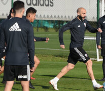 Pinola y Pratto durante el entrenamiento en Ezeiza.