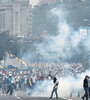 Los choques callejeros que el miércoles protagonizaron opositores y oficialistas dejaron como corolario tres muertos. (Fuente: AFP)