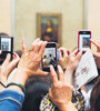 En 2012 el británico Martin Parr fotografió a turistas capturando a la Gioconda con sus smartphones en el Museo del Louvre.