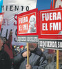 Por el enorme operativo de seguridad, la manifestación contra el FMI se realizó ayer en Puerredón y Las Heras. (Fuente: AFP)