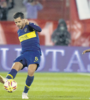 Fernando Gago, conductor de Boca, y Andrés Chavez, delantero del Globo. (Fuente: Fotobaires)