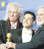 Brian May, Rami Malek y Roger Taylor, sonrientes ganadores por la biopic centrada en Freddie Mercury. (Fuente: EFE)