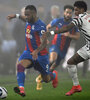 Marcus Rashford, en función defensiva, ante el ghanés Jordan Ayew de Crystal Palace. (Fuente: AFP)