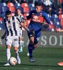 Ortegoza avanza ante "Equi" González. Tigre igualó con la T (Fuente: Fotobaires)