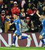 Ramírez y Cándido celebran el pase a cuartos de final de Nacional (Fuente: Fotobaires)